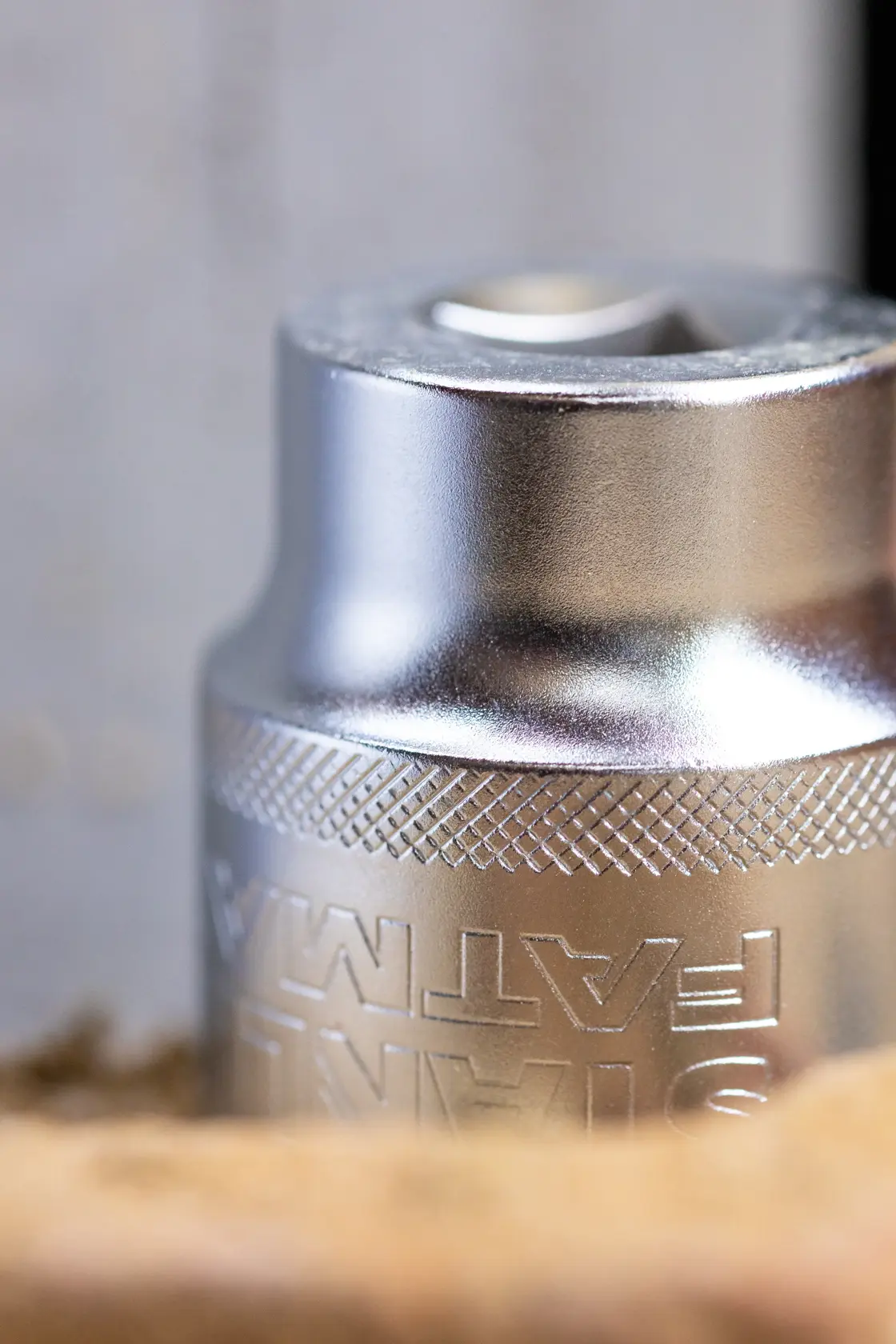 Photo of STANLEY FMMT17233-0 silver socket with knurled grip, close-up angle.